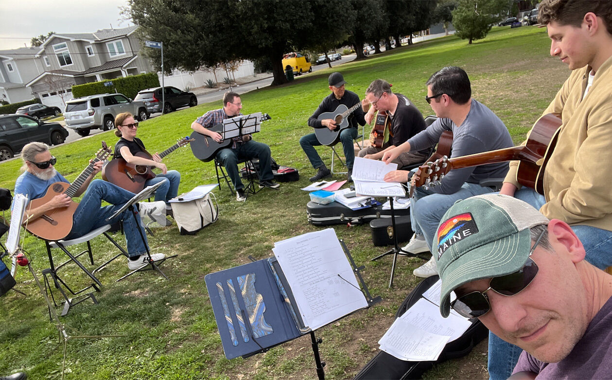 Matthew at a community jam outside